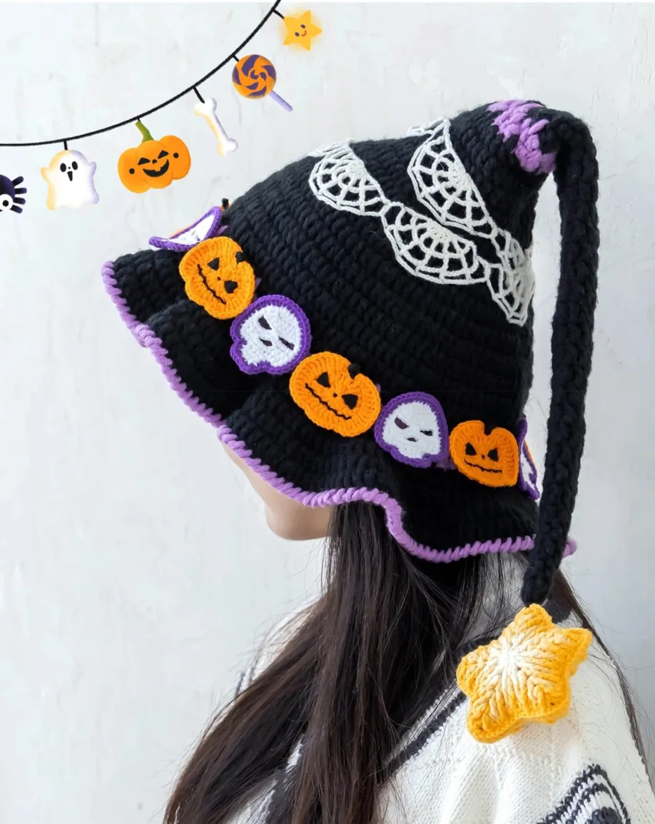 Black crochet witch hat with lavender trim, pumpkins and spiderweb details